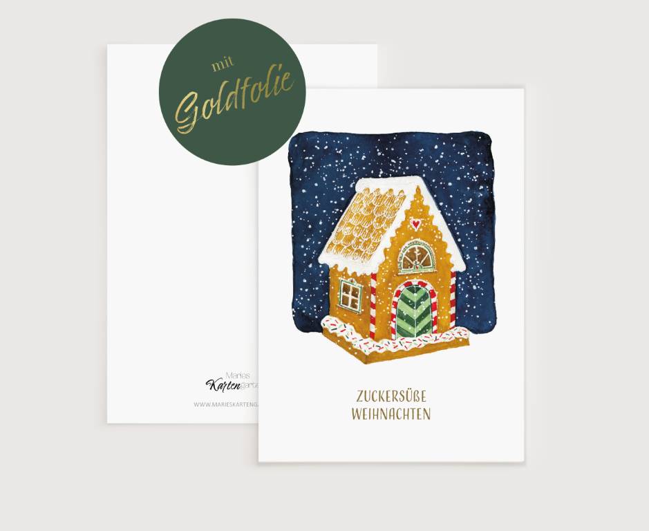 a christmas card with a ginger house on it