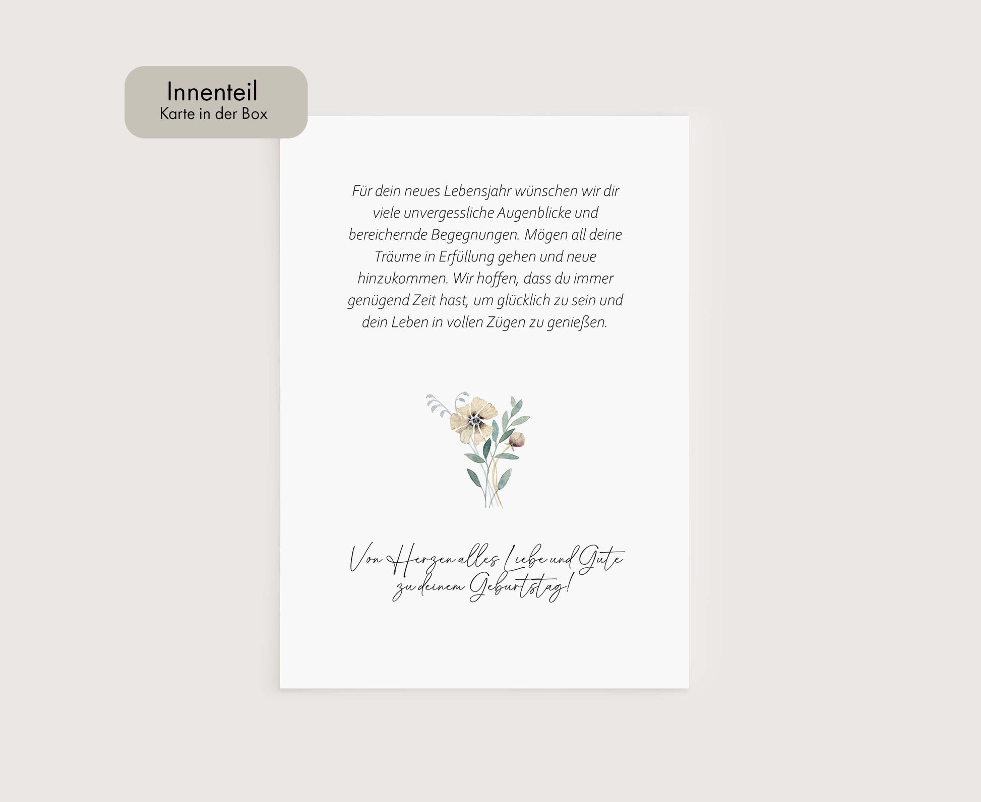 a white card with a flower on it