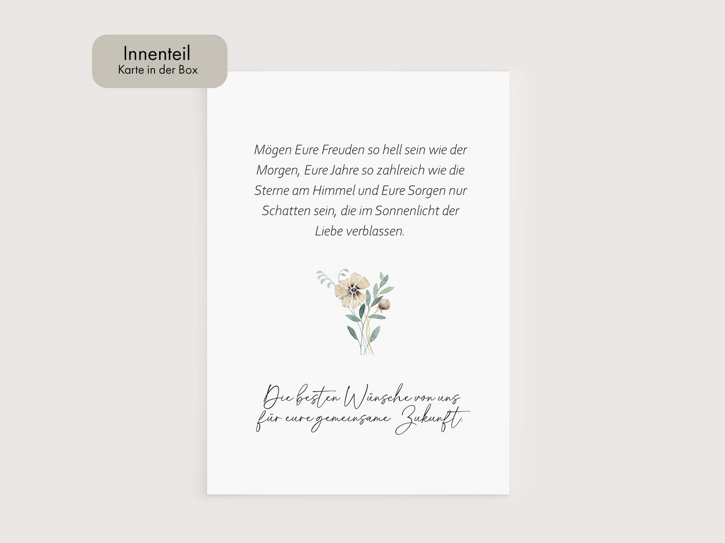 a white card with a flower on it