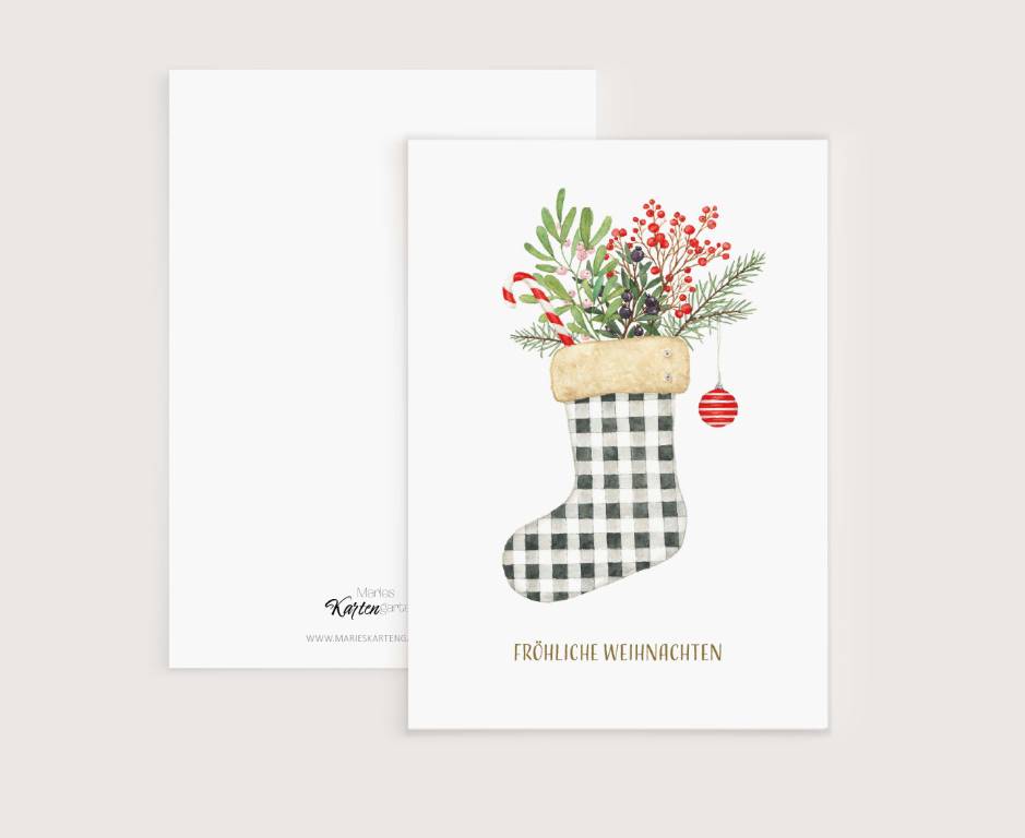 a christmas card with a stocking filled with flowers