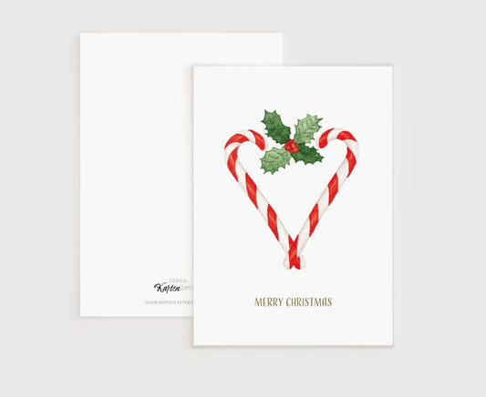 a christmas card with candy canes and holly