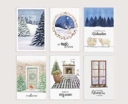 a set of four christmas cards with a winter scene