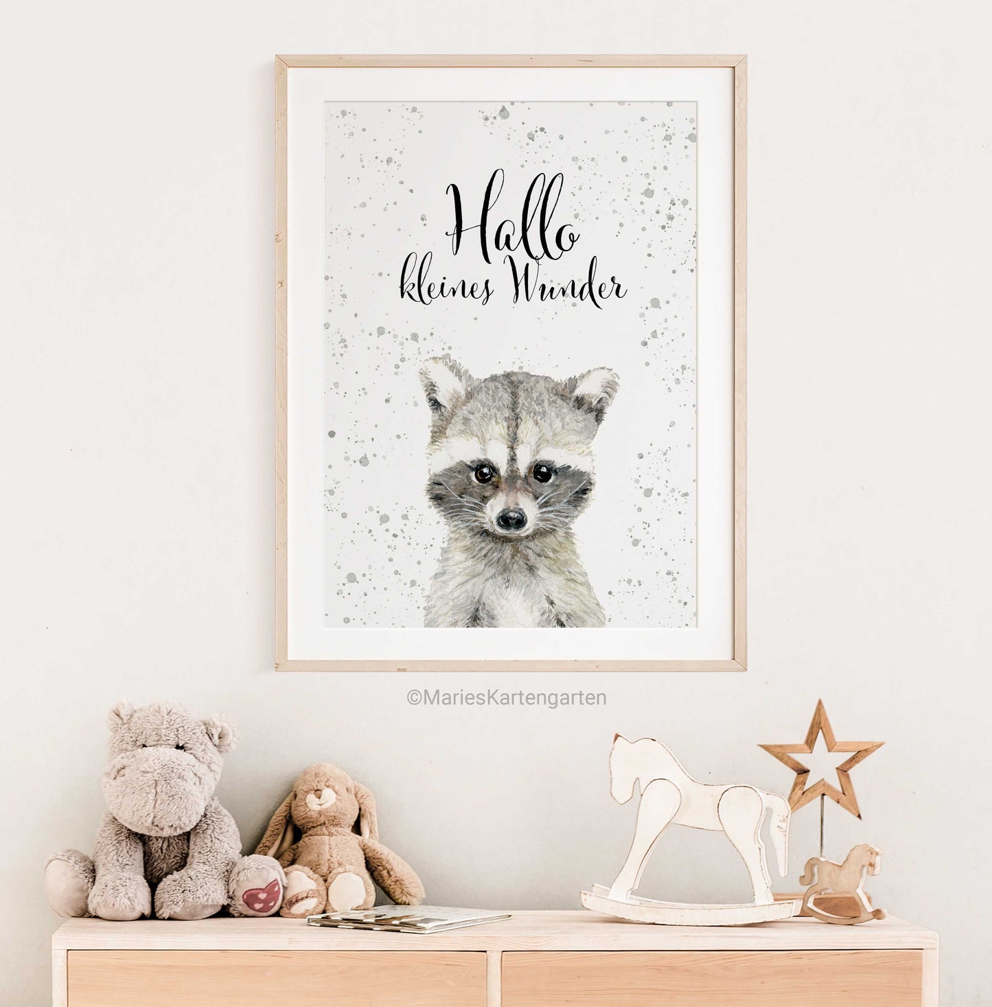 a picture of a raccoon on a wall above a dresser