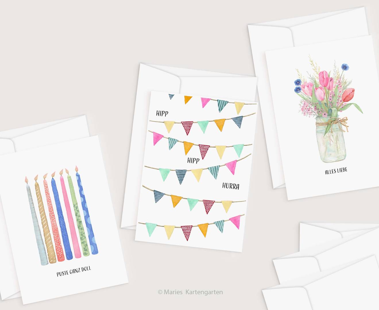 a bunch of cards with a vase of flowers