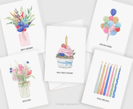 a bunch of cards that have some flowers in them