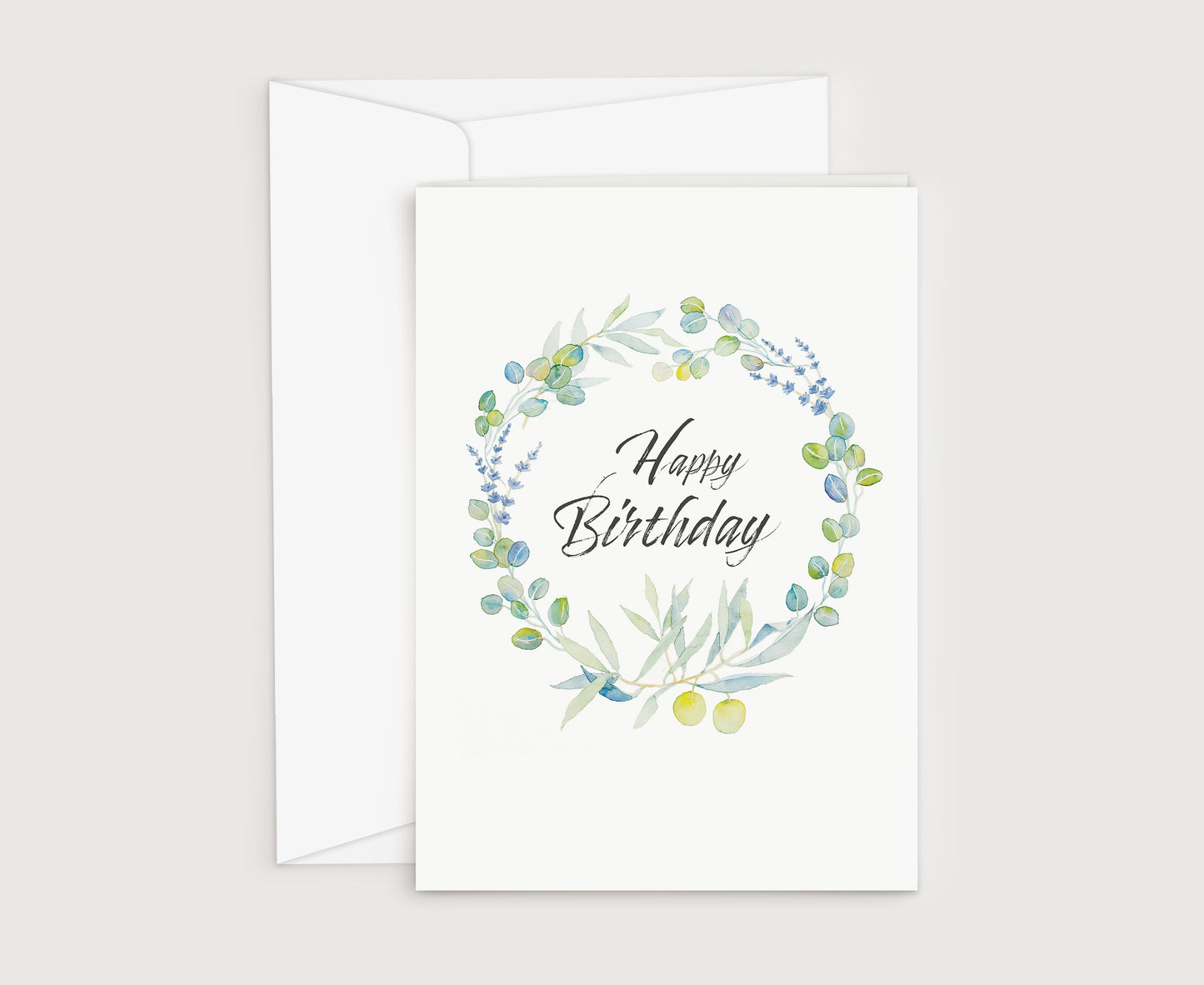 a birthday card with a watercolor wreath on it