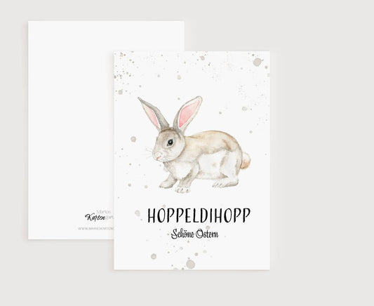 a card with a watercolor bunny on it