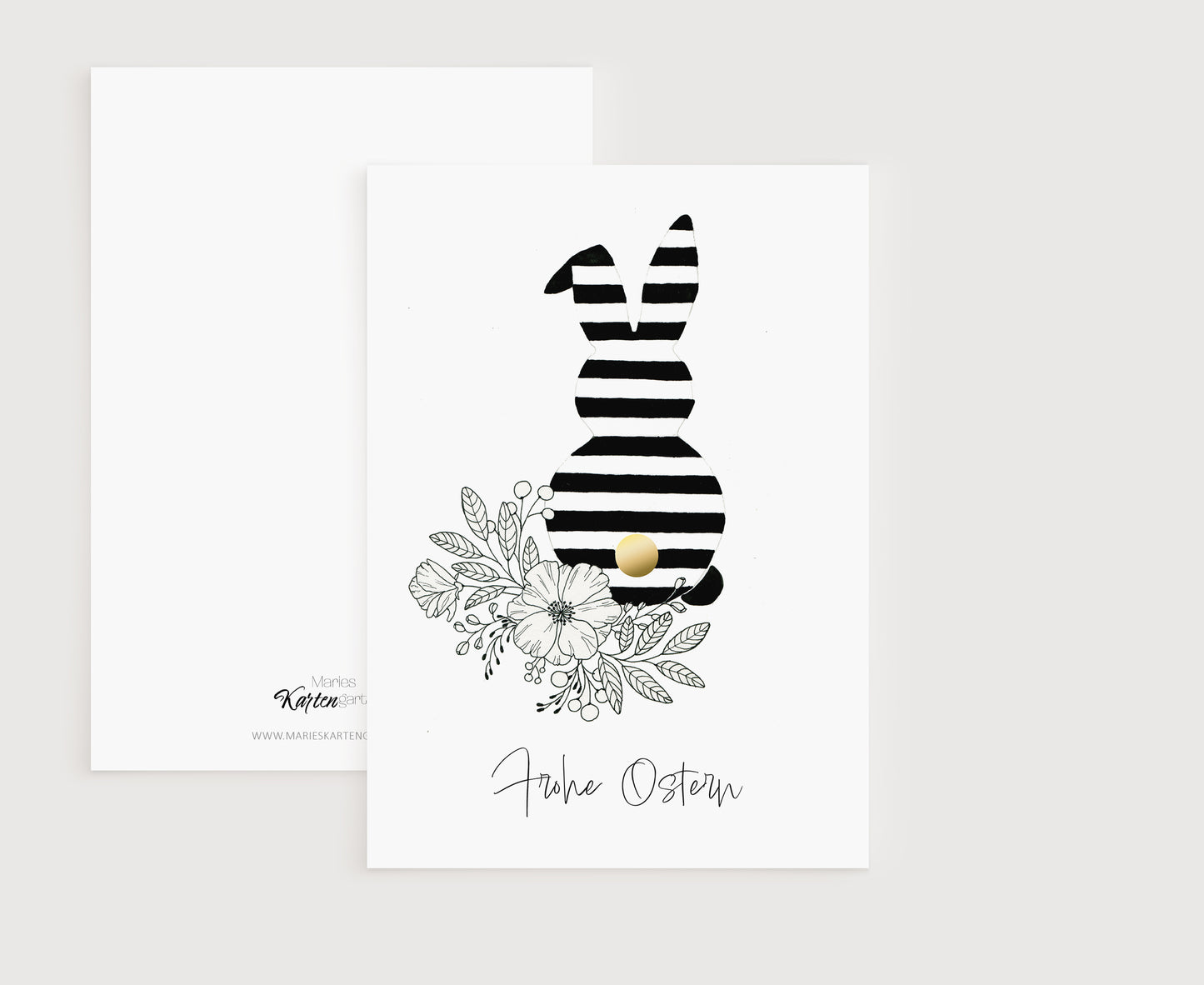 a greeting card with a black and white rabbit on it