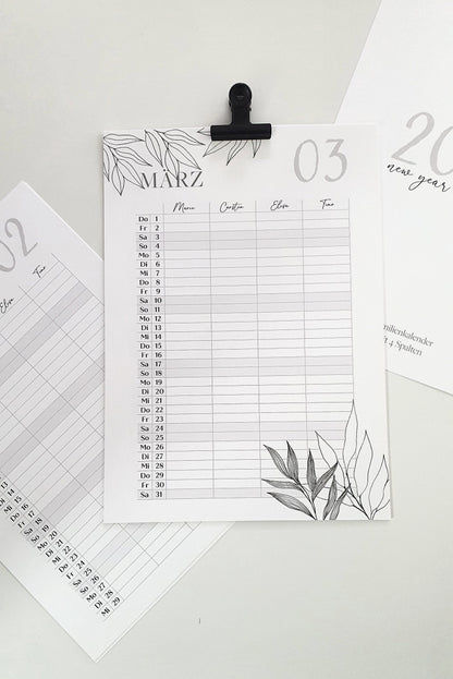 a clipboard with a calendar attached to it